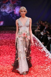 Silk rose petals creating an ombre effect at the Claire Pettibone show.